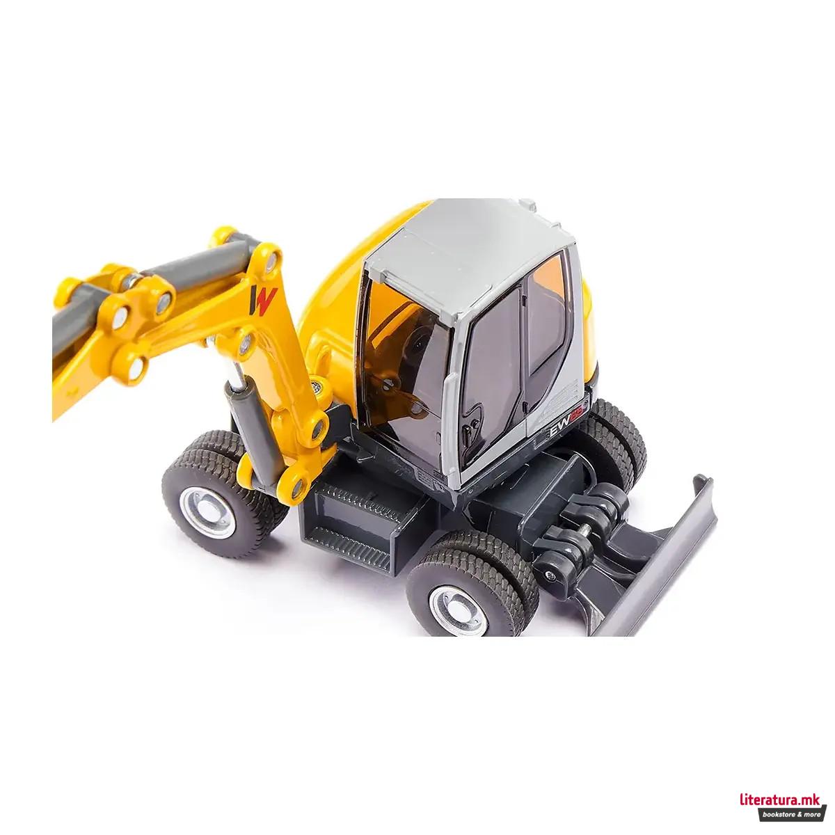 Фигура, Wacker Neuson EW65 Mobile Excavator 